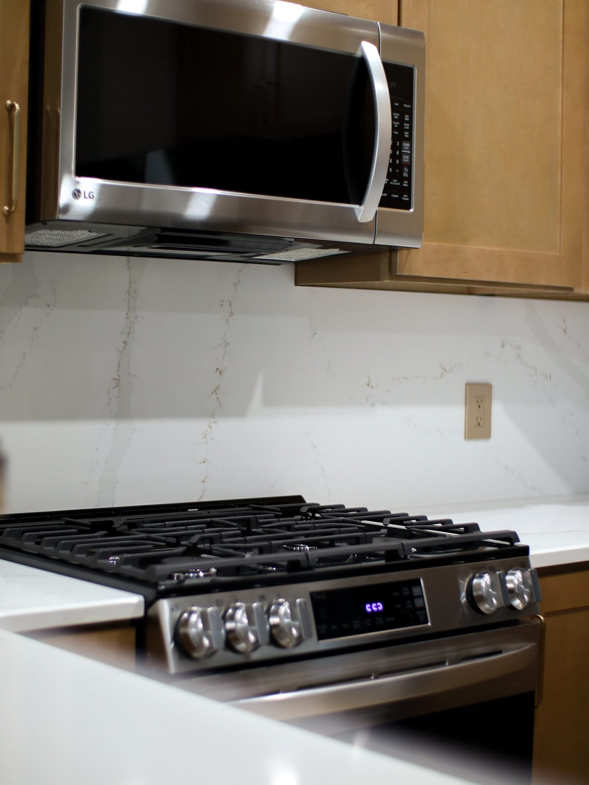 Stainless microwave above the gas range